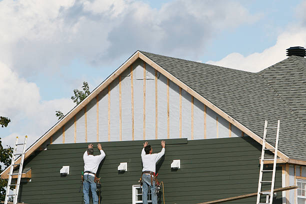 Professional Siding Repair technician working in Hammondsville, OH
